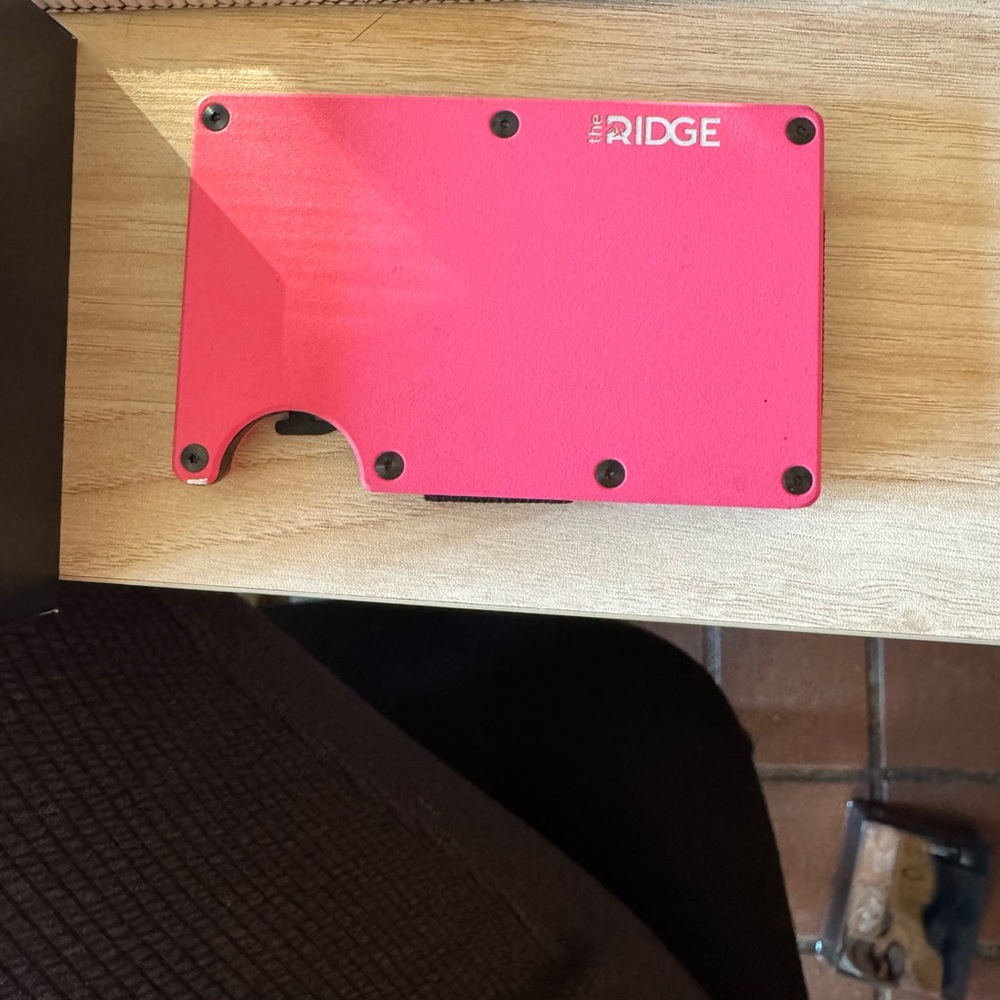 The ridge pink flamingo wallet with cash strap